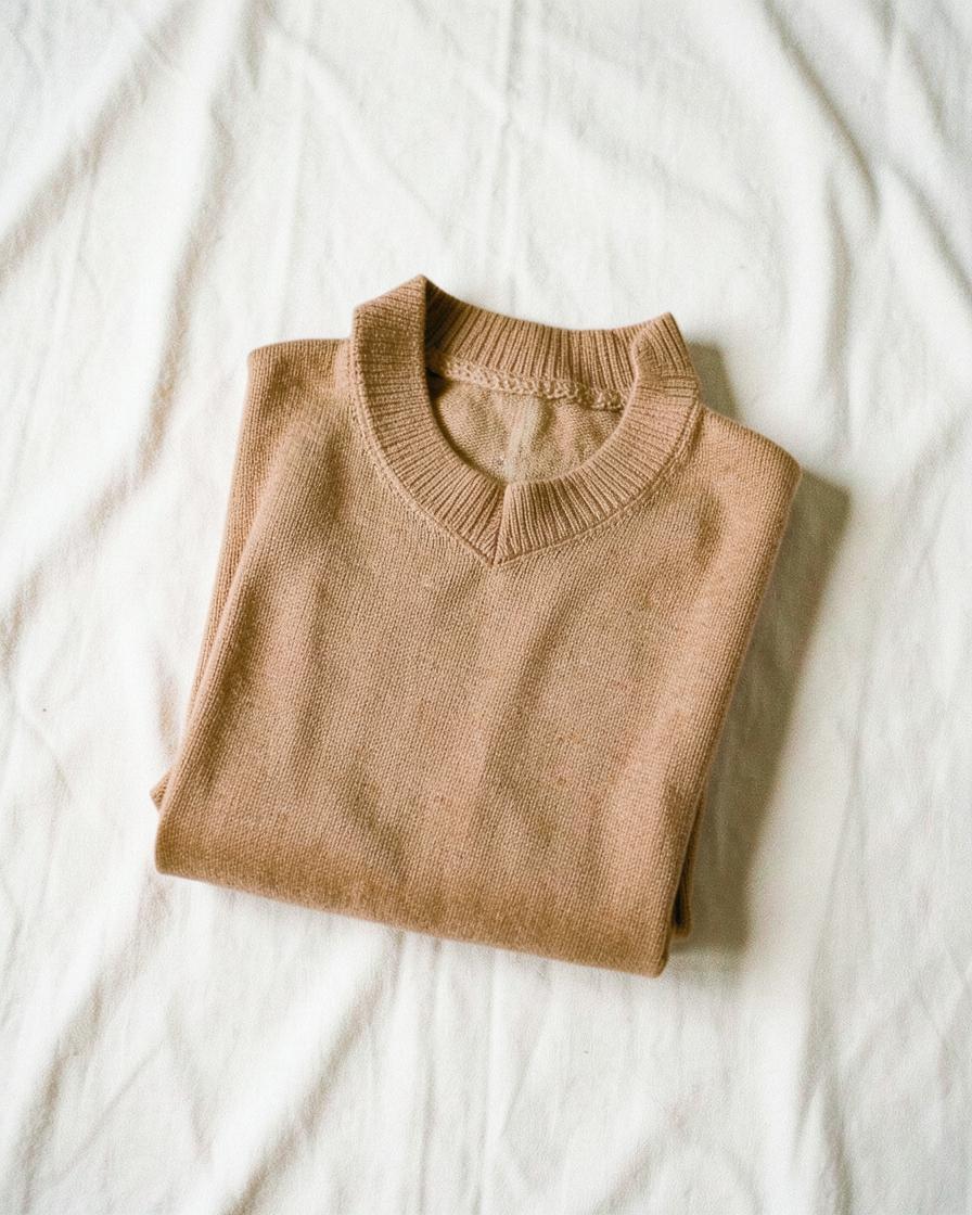 Alpaca Knit Crew in Canela, folded flat lay